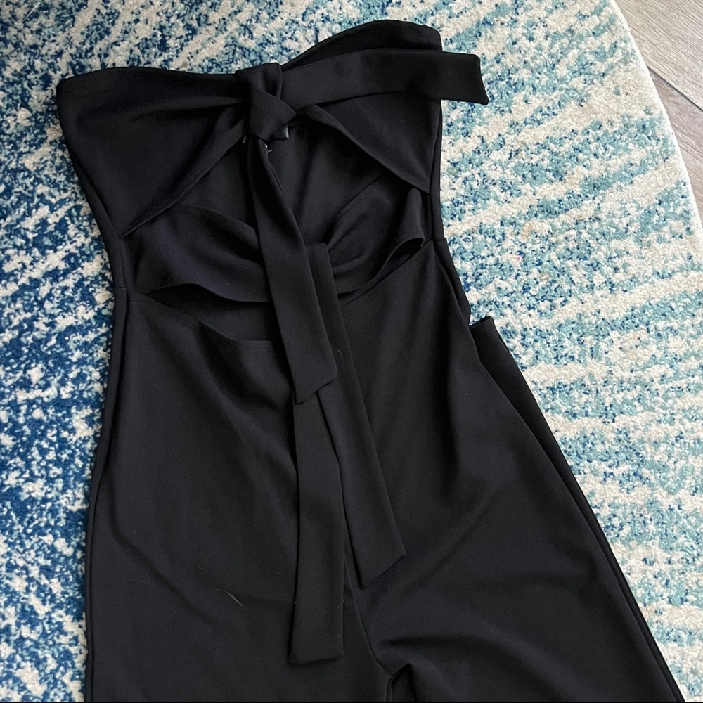 Long wide-leg jumpsuit with cut out details